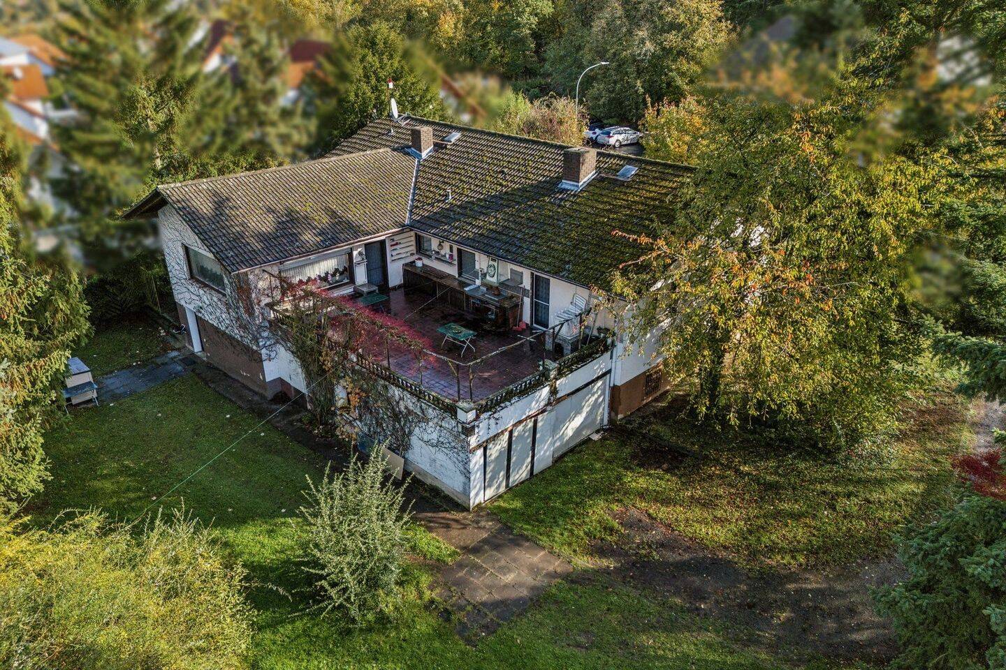 Großer Winkel-Bungalow mit möglicher Einliegerwohnung in Münzenberg zentral, 35516 Münzenberg