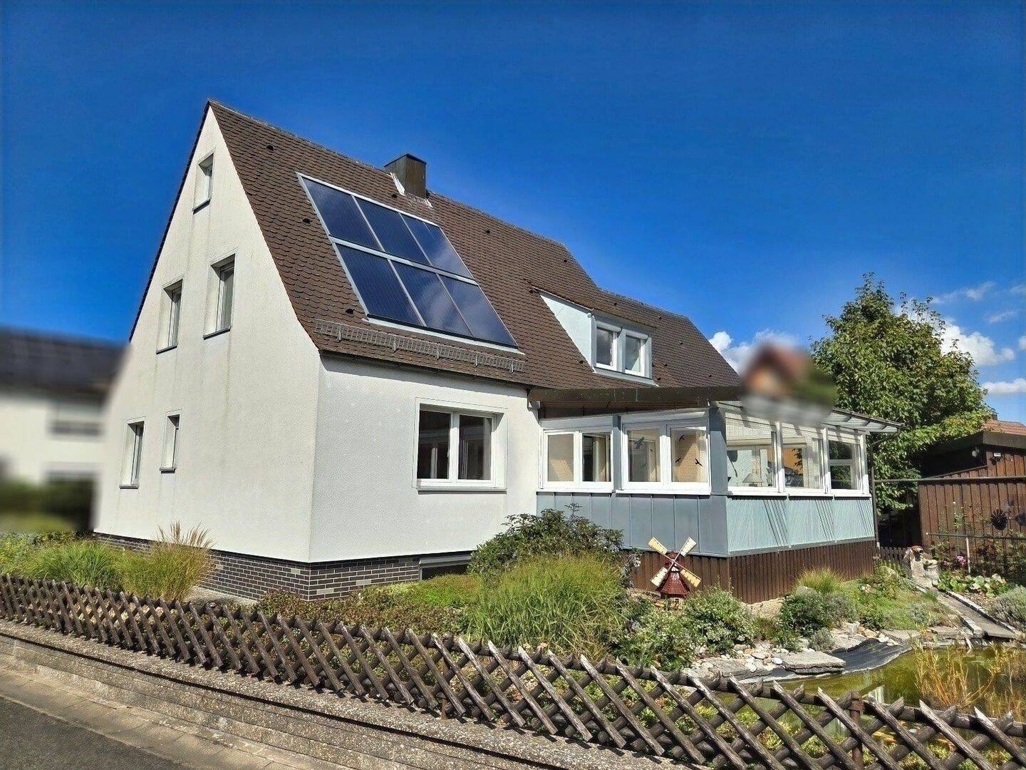Gepflegtes und modernisiertes EFH mit Garten in ruhiger Siedlungslage von Sand am Main, 97522 Sand a. Main