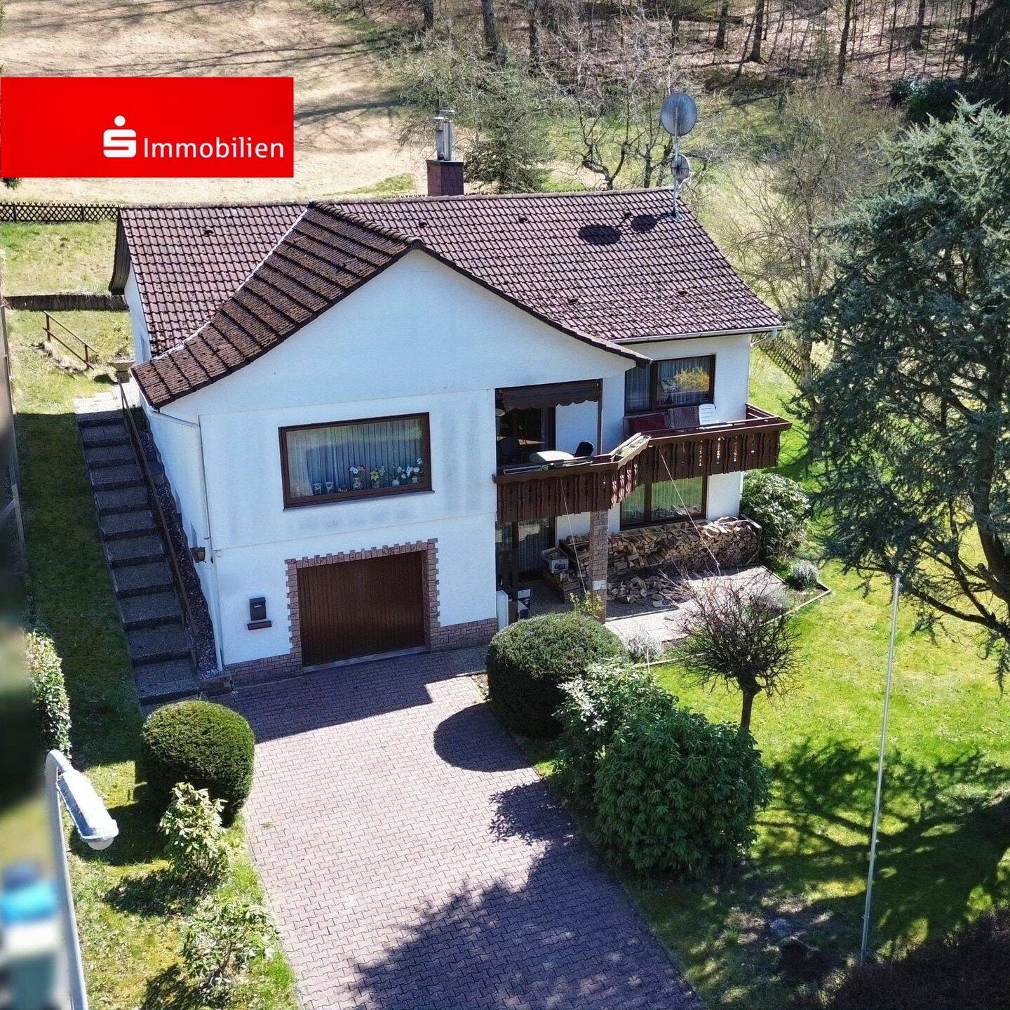 Einfamilienhaus mit großem Grundstück und Garage in Flörsbach, 63639 Flörsbachtal