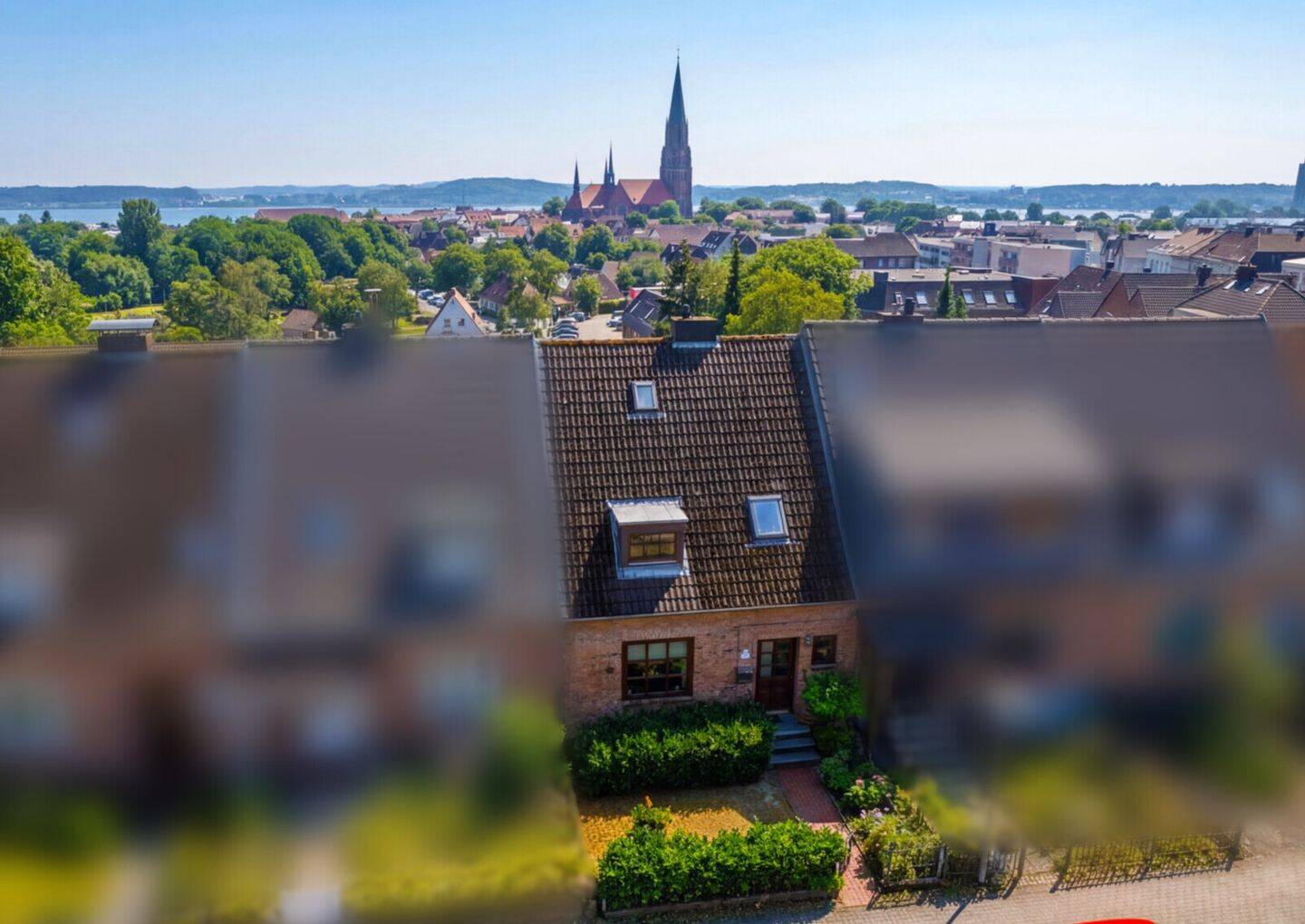 Wohnen mit Schleiblick! Gepflegtes RMH mit ca. 100 m² Wfl., Süd-Balkon, Garten & 2 Stellplätzen!, 24837 Schleswig