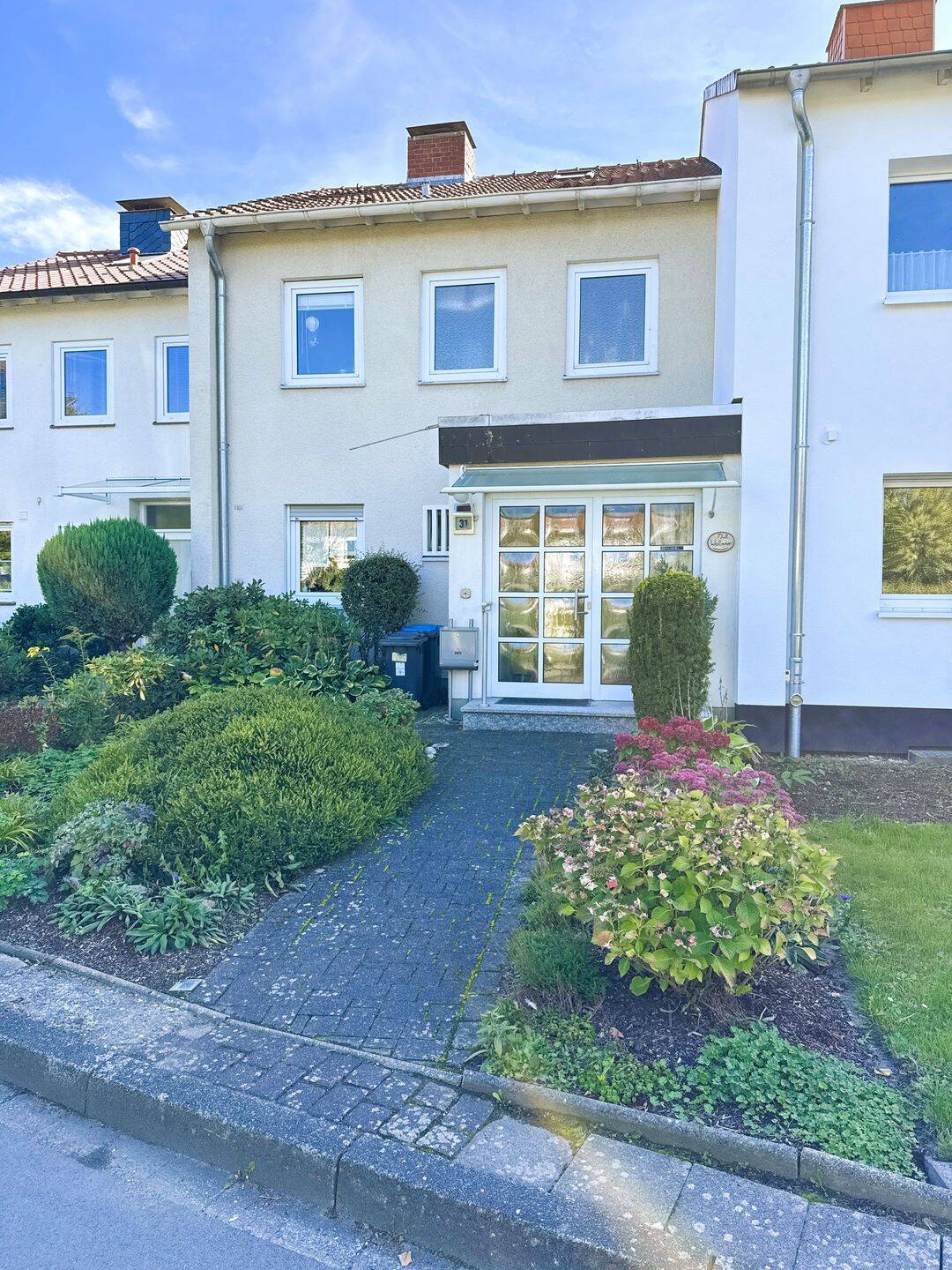 ZU VERKAUFEN: Ruhig gelegenes Reihenmittelhaus im Soester Westen mit PV-Anlage, Garage und Garten, 59494 Soest