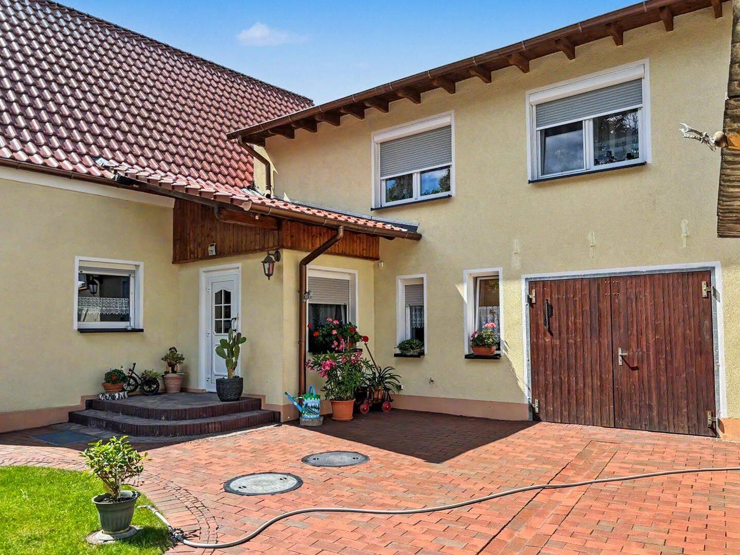 Ein Zuhause zum Verlieben – gepflegtes Einfamilienhaus mit traumhaftem Innenhof in Jessen Annaburg, 6925 Annaburg