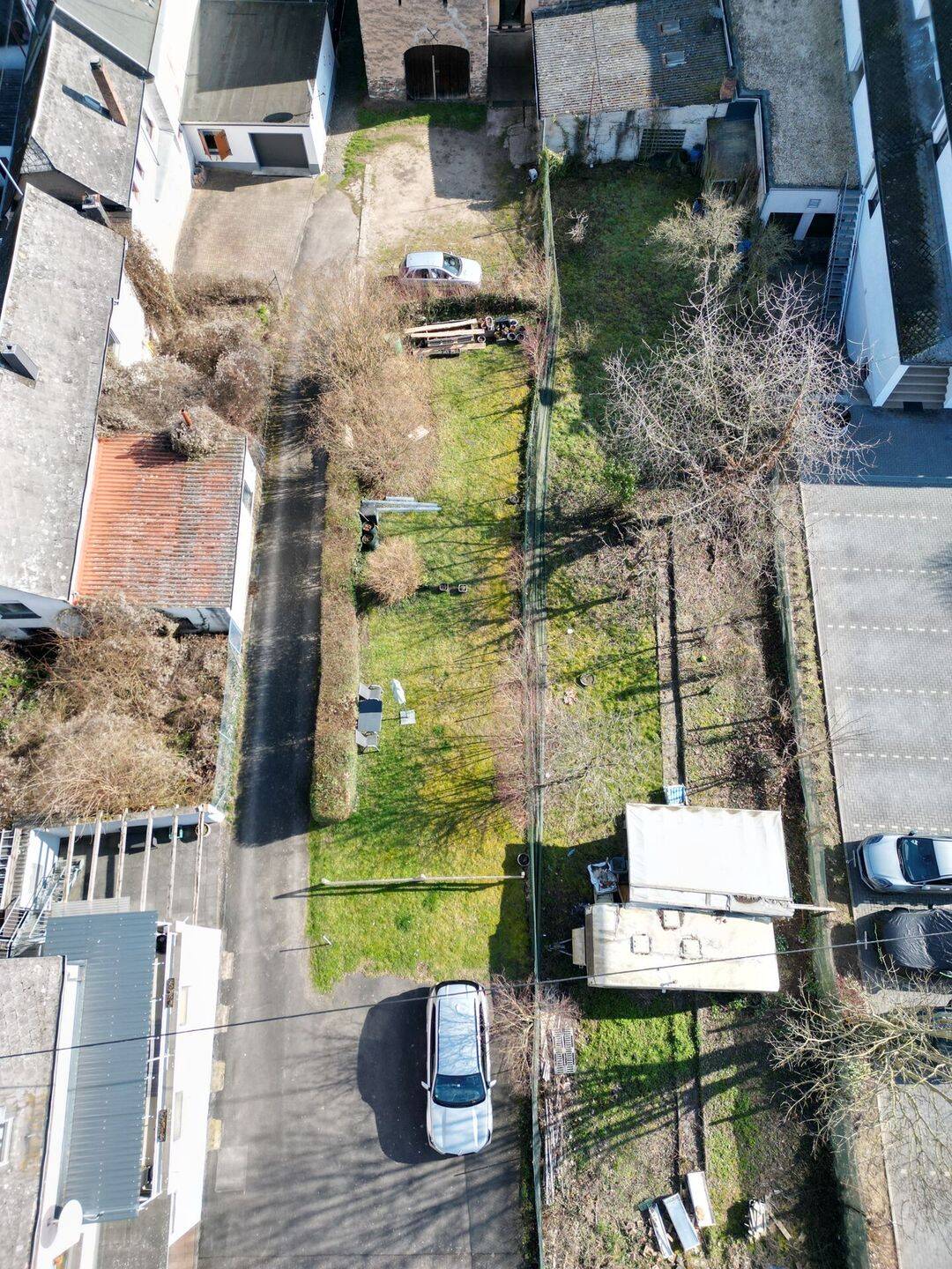 Investoren gesucht – Grundstück mit Entwicklungspotenzial und zwei vermietete Einfamilienhäuser in Löf an der Mosel!, 56332 Löf