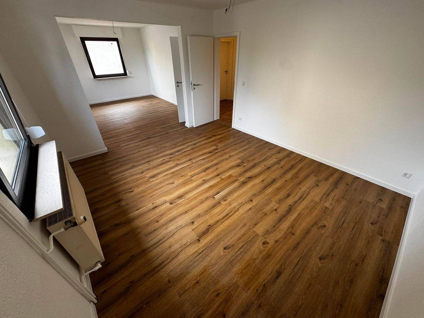 Wohnen mit Garten: Sanierte Erdgeschosswohnung mit Doppelgarage und Keller, 76461 Muggensturm