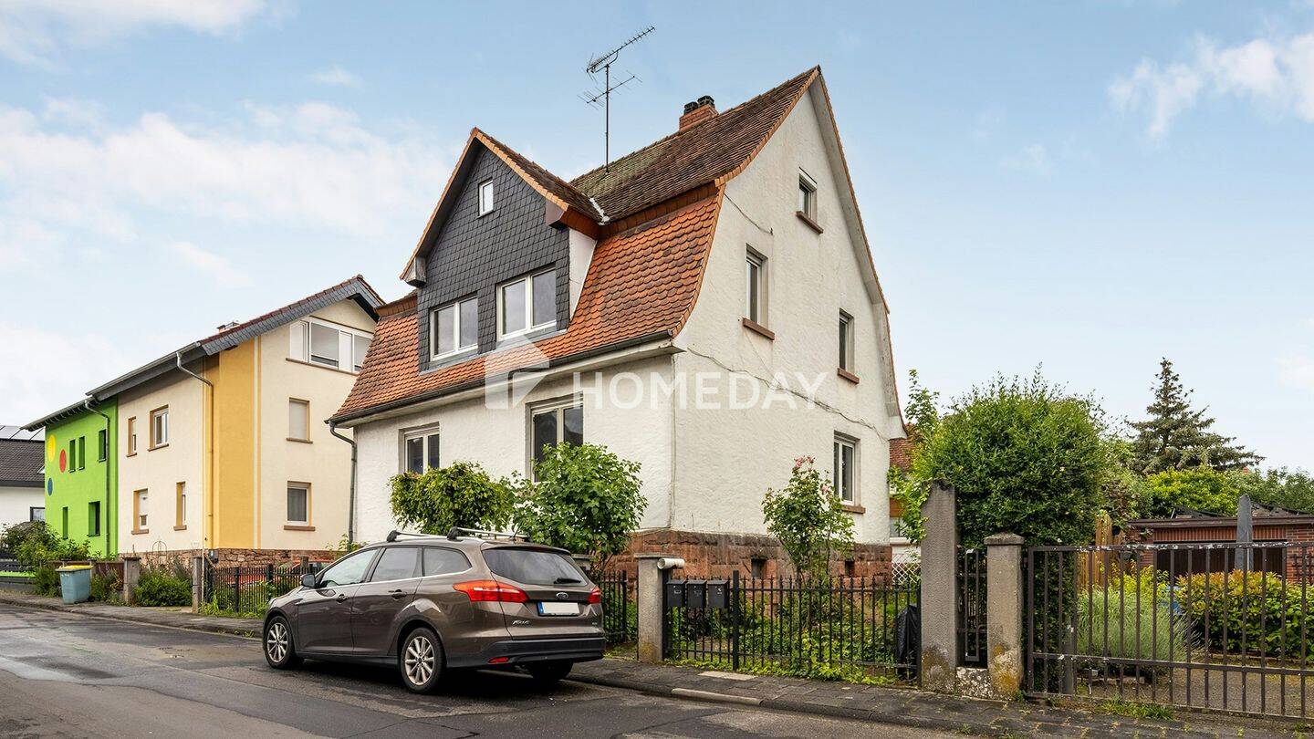 Großzügiges Zweifamilienhaus mit 8 Zimmern und Garten in ruhiger Lage, 63584 Gründau