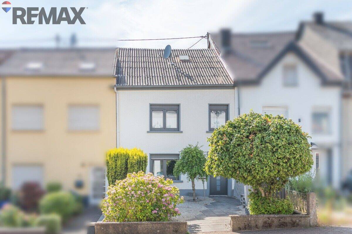Viel Platz für die Familie – gepflegtes Reihenmittelhaus mit Wintergarten in Orscholz, 66693 Mettlach