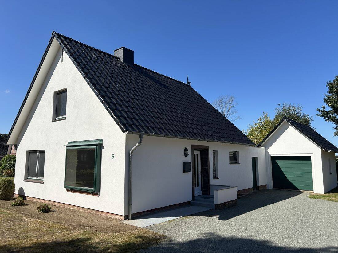 Charmantes Einfamilienhaus mit Garage und Werkstattgebäude, 25727 Süderhastedt
