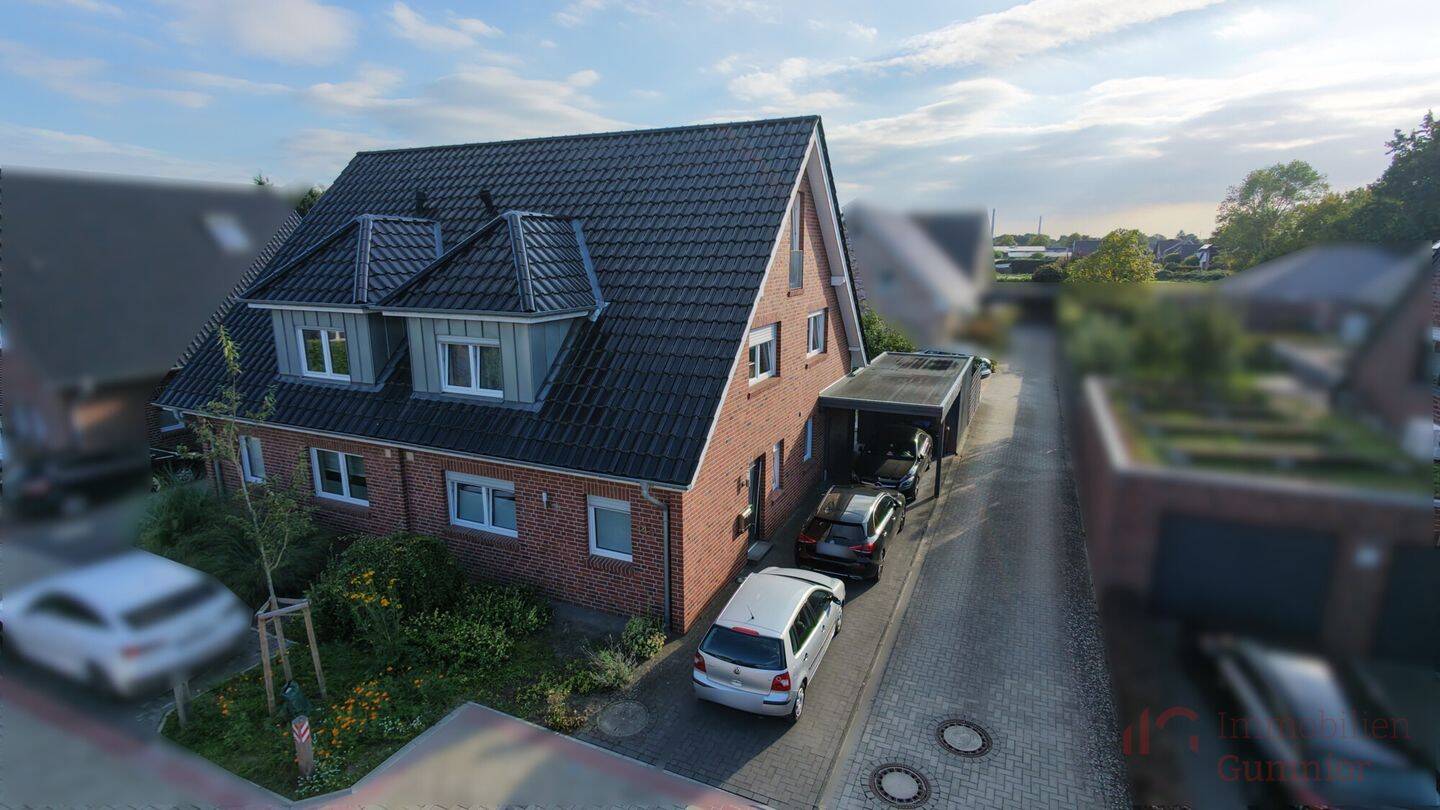 IMMOBILIEN GUMNIOR präsentiert: Moderne Doppelhaushälfte mit gut geschnittenen Räumen und uneinsehbarem Südwestgarten in Ochtrup, 48607 Ochtrup