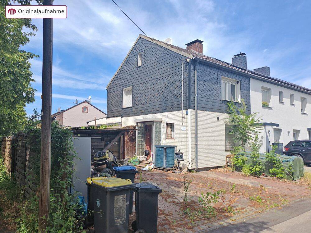 Zwangsversteigerung: Reihenendhaus mit Anbau, Terrasse und Carport in Duisburg-Walsum, 47169 Duisburg (Aldenrade Fahrn Marxloh Röttgersbach Wehofen)
