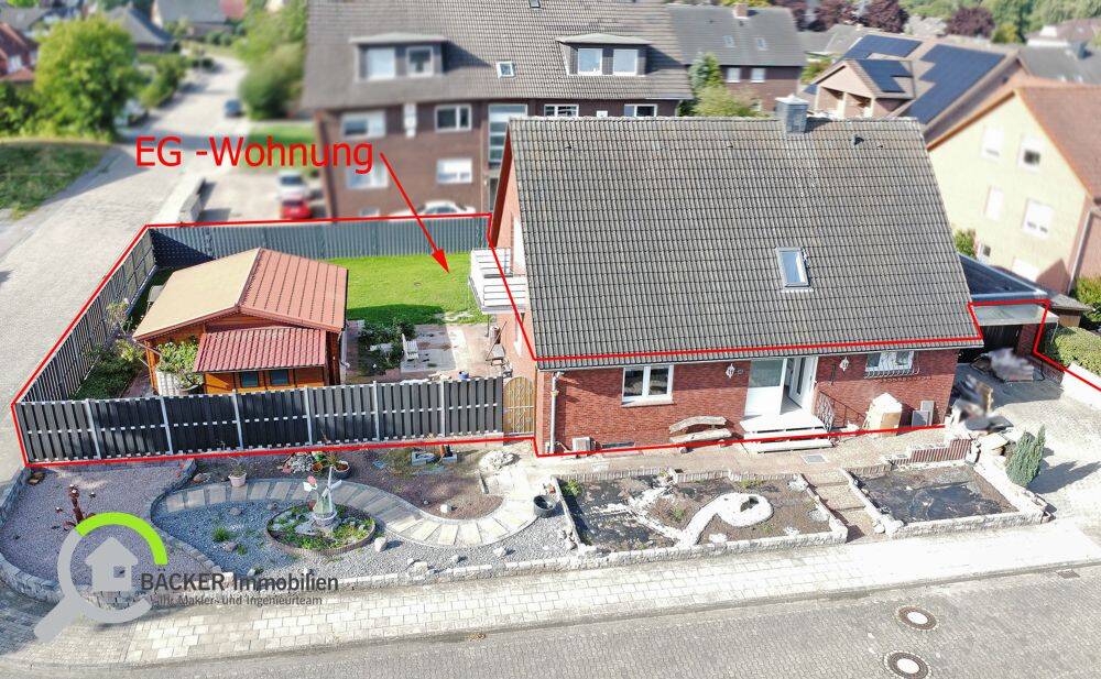 Modernisiertes Wohnen mit viel Grün – Erdgeschosswohnung mit Wintergarten und Garage, 49448 Lemförde