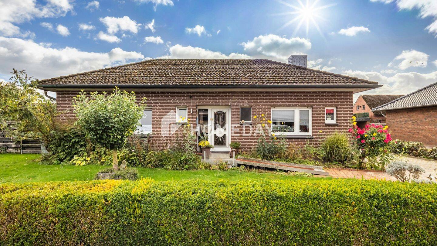 Barrierefreier Bungalow mit Kamin, Garage, Garten und Ausbaureserve in Visbek, 49429 Visbek