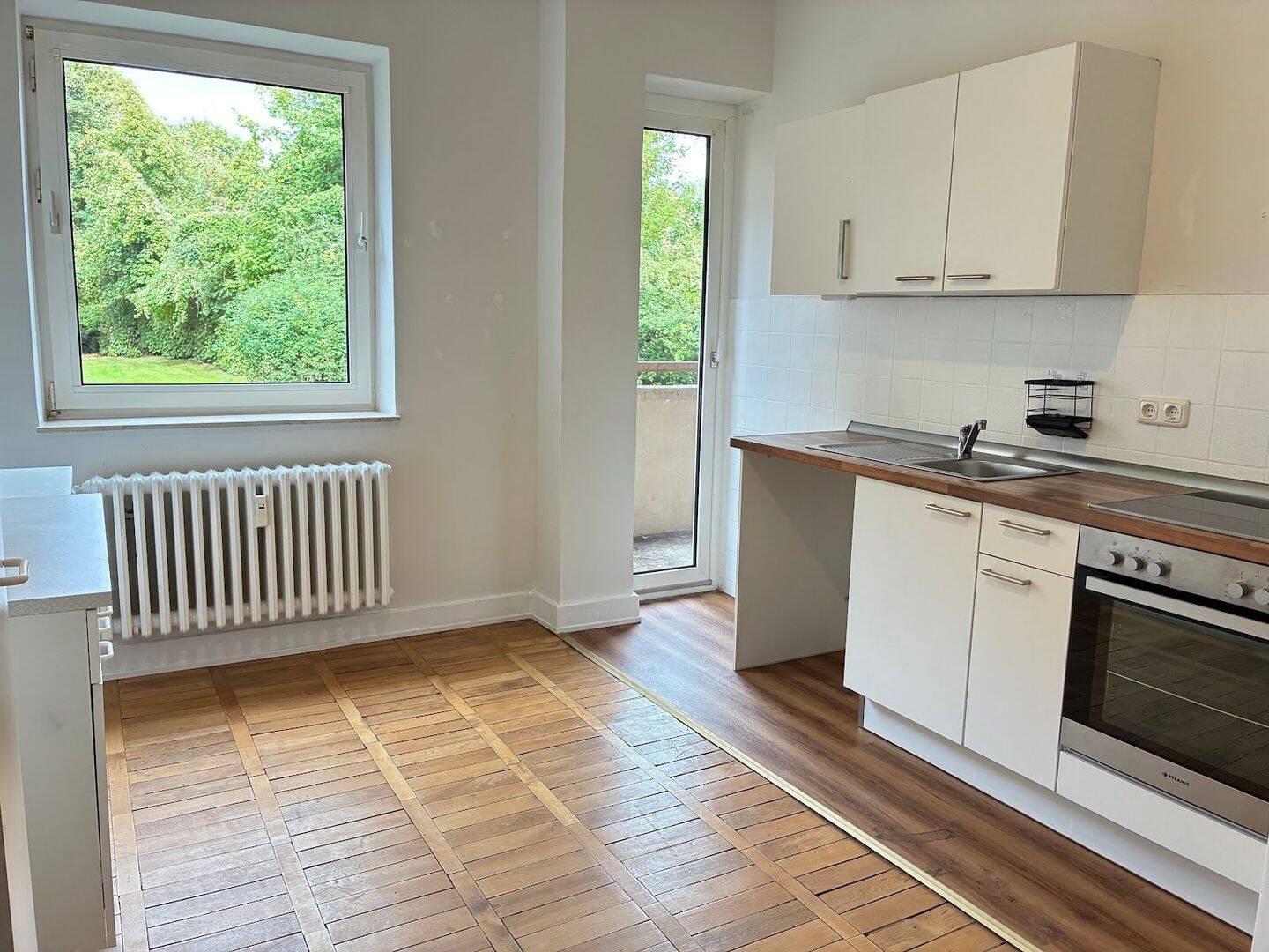 Erdgeschosswohnung mit großer Wohnküche und Balkon, 24149 Kiel (Neumühlen-Dietrichsdorf)
