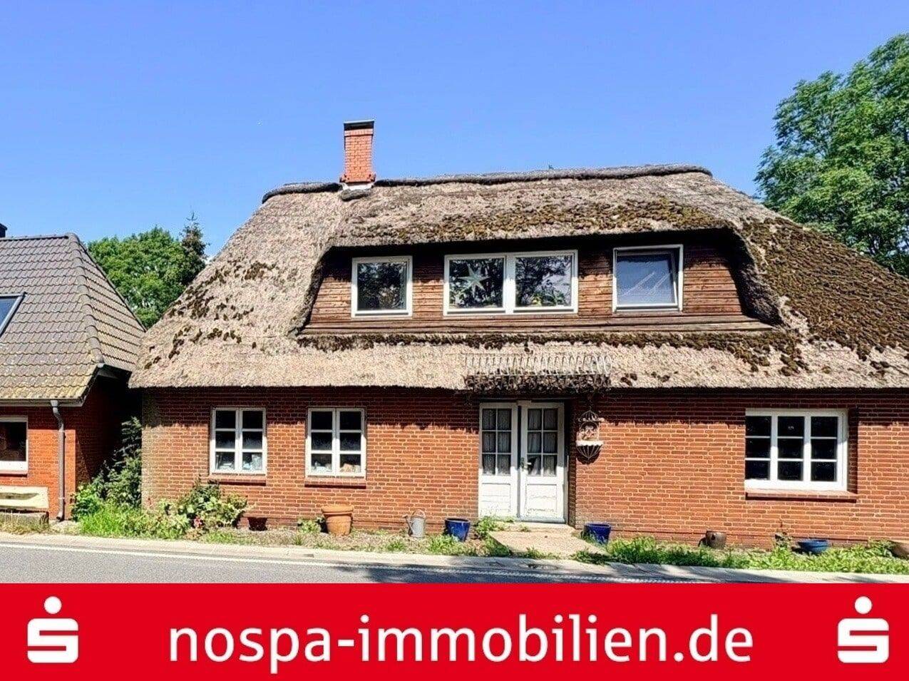 Einfamilienhaus mit Einliegerwohnung unter Reet!, 25836 Poppenbüll