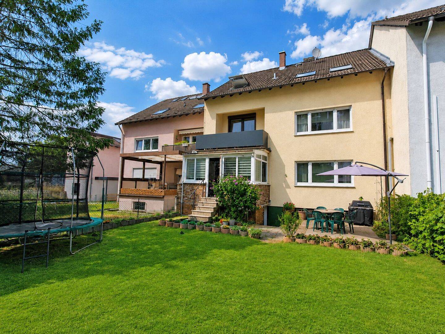 Erdgeschosswohnung mit Wintergarten und Garten, 64291 Darmstadt (Arheilgen Wixhausen)