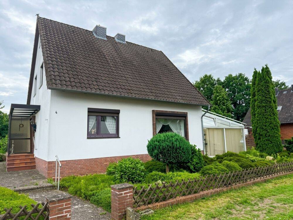 Dörverden: Gemütliches Einfamilienhaus mit Wintergarten und Garage am Ende einer Anliegersackgasse, 27313 Dörverden