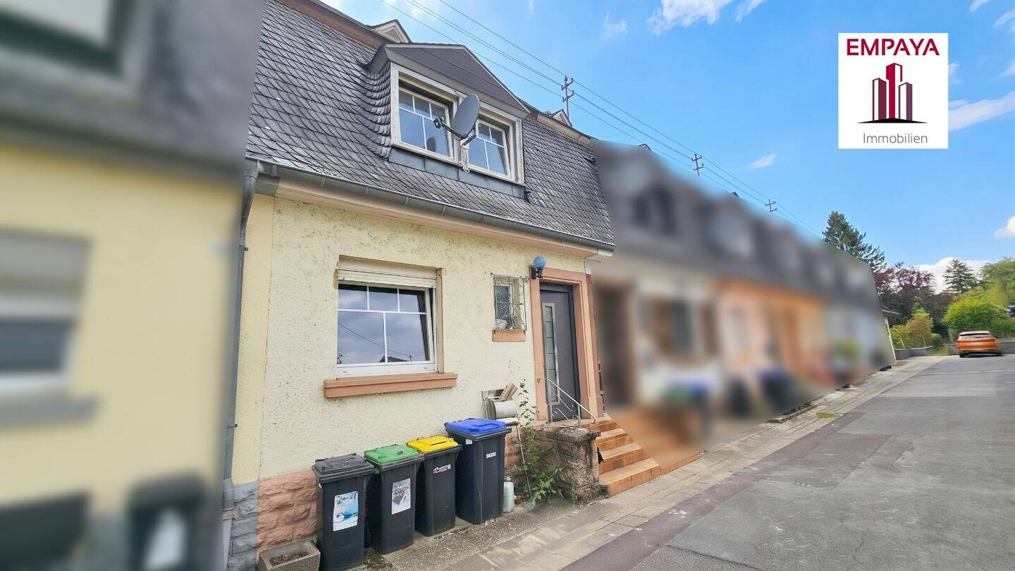 Reihenmittelhaus mit Gartengrundstück und Garage in Perl, 66706 Perl