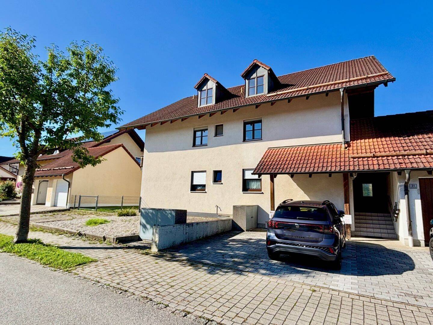 Großzügige 4-Zimmer-Wohnung im 1. Obergeschoss mit eigenem Gartenbereich in Tann, 84367 Reut (Tannberg)