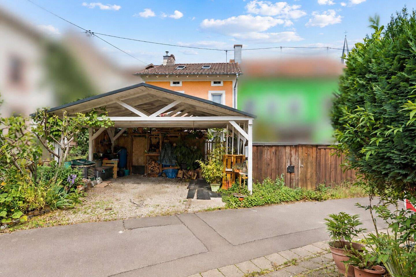 Familienfreundliches Reihenmittelhaus mit idyllischem Außenbereich und Carport, 66663 Merzig