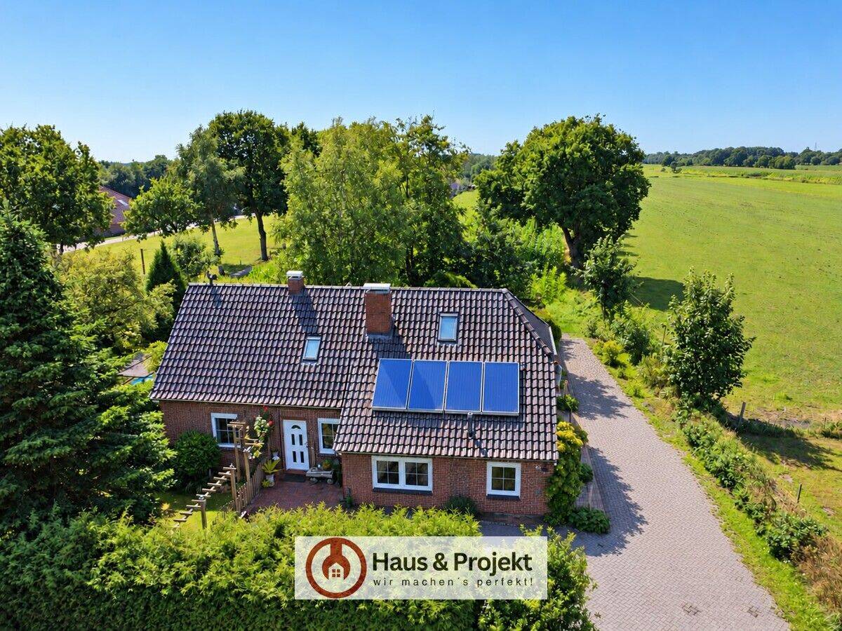 Ländliche Idylle bei Aurich – Charmantes Landhaus mit 1.221 m² Grundstück, Kamin & viel Privatsphäre!, 26605 Aurich