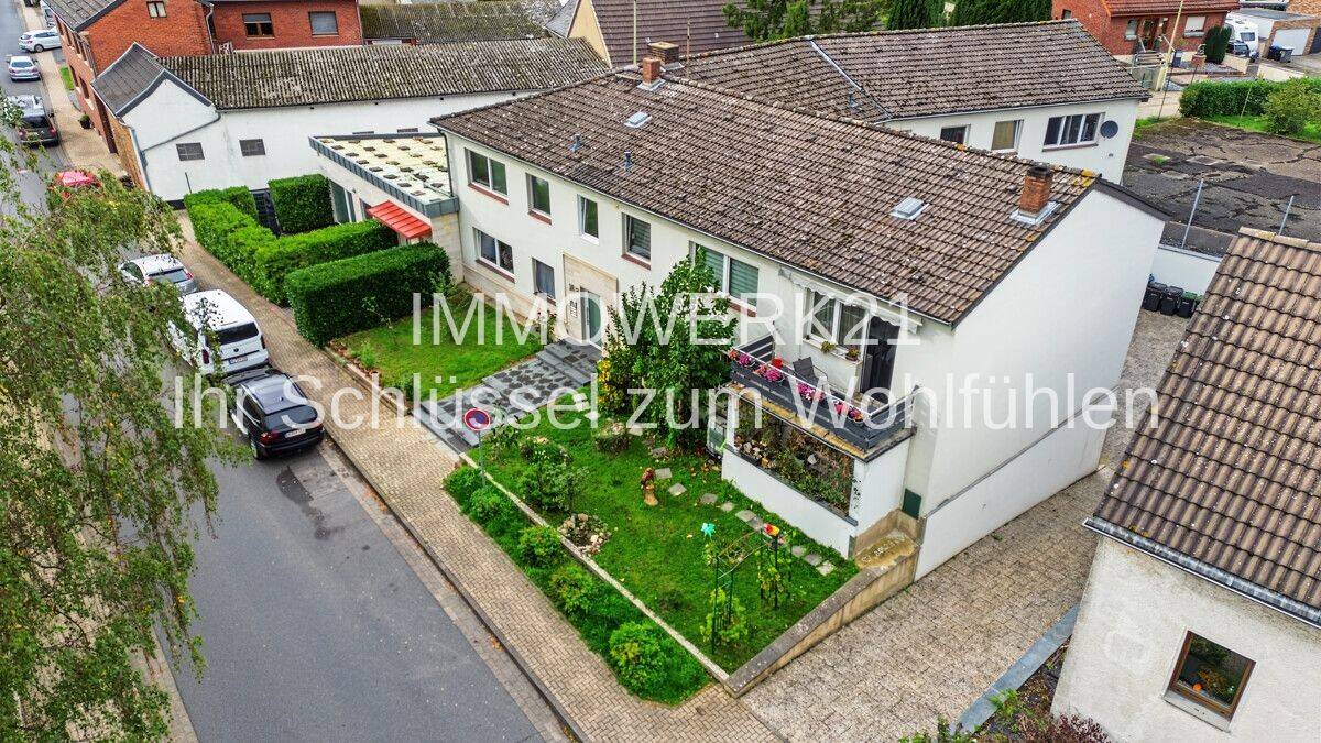 Modernisierte 4-Zimmer-Wohnung in Nörvenich-Rath mit Kamin, Balkon & Doppelgarage, 52388 Nörvenich