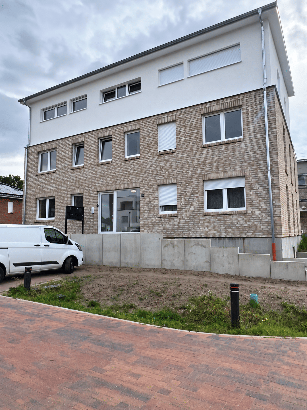 Moderne 3-Zimmer-Erdgeschosswohnung mit offener Wohnküche, Ankleide und Terrasse in Martfeld, 27327 Martfeld