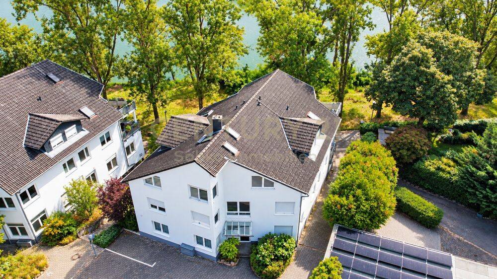 Wohnen mit Urlaubsgefühl – 3 Zimmer direkt am Main mit Balkon & 2 Stellplätzen, 65239 Hochheim am Main