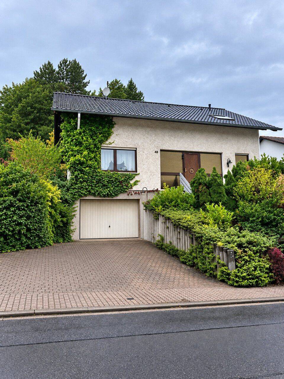 Großzügiges Einfamilienhaus in Großrosseln – Stilvolles Wohnen mit Kamin und großem Garten, 66352 Großrosseln