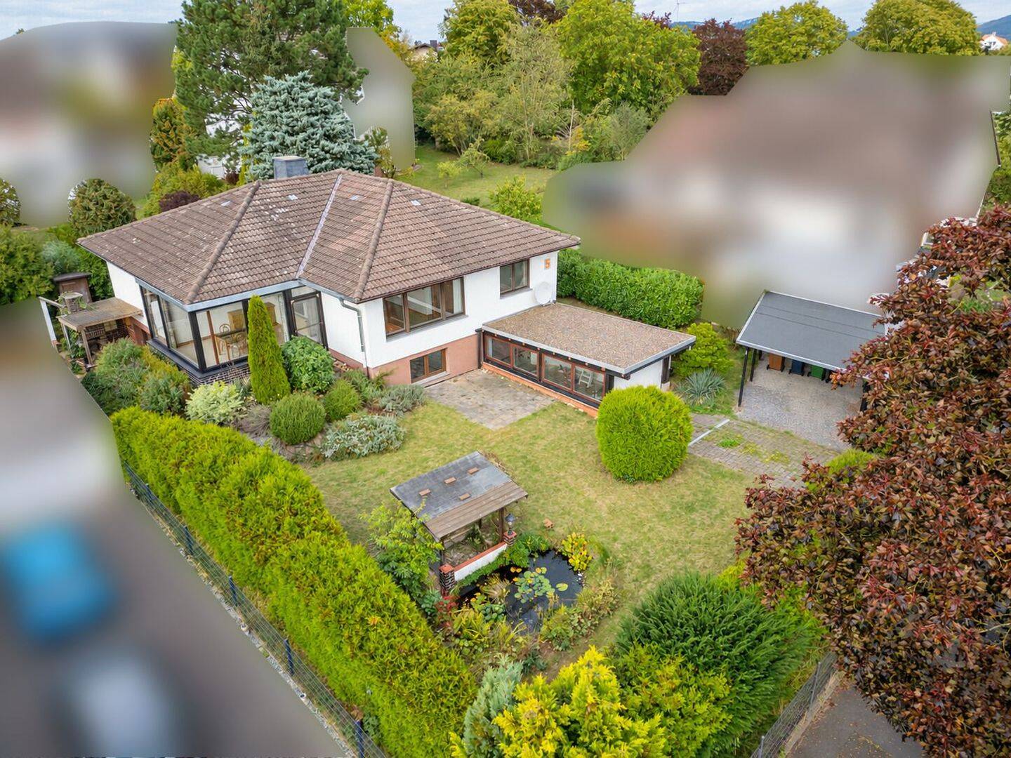 Attraktiver Winkelbungalow mit lichtdurchflutetem Wintergarten und großem Garten, 34466 Wolfhagen