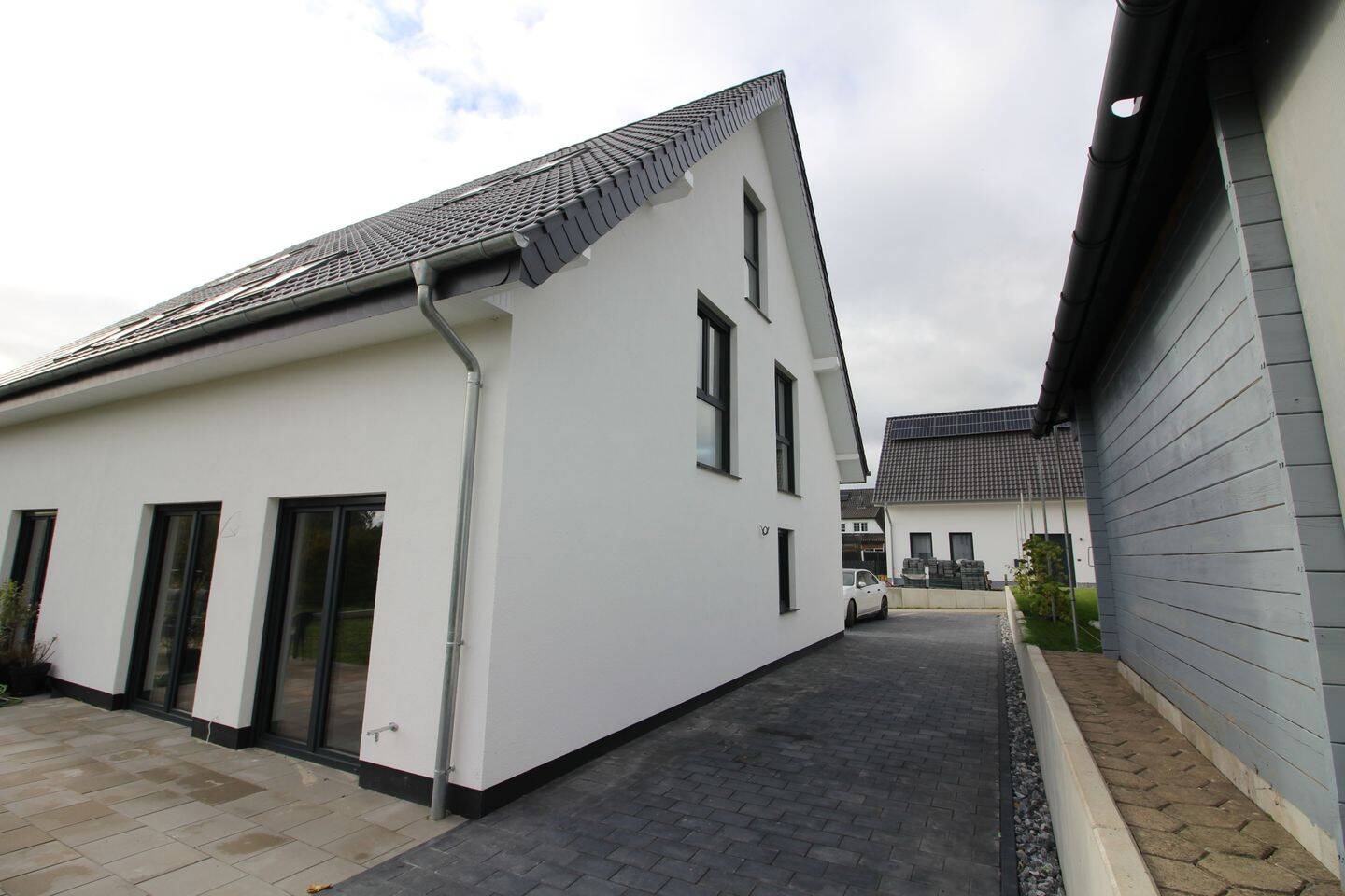 Moderne Neubau-Doppelhaushälfte mit Terrasse – energieeffizient im KfW-55-Standard, 32278 Kirchlengern