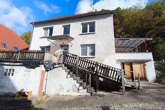 Renovierungsbedürftiges, freistehendes Einfamilienhaus mit Garage, überdachter Terrasse und Gartengrundstück, 67752 Oberweiler-Tiefenbach