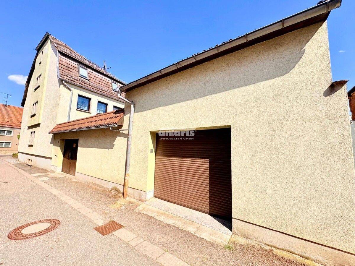 antaris Immobilien GmbH **Einfamilienhaus mit Charme, Innenhof, Garage und Gartengrundstück**, 99955 Bad Tennstedt