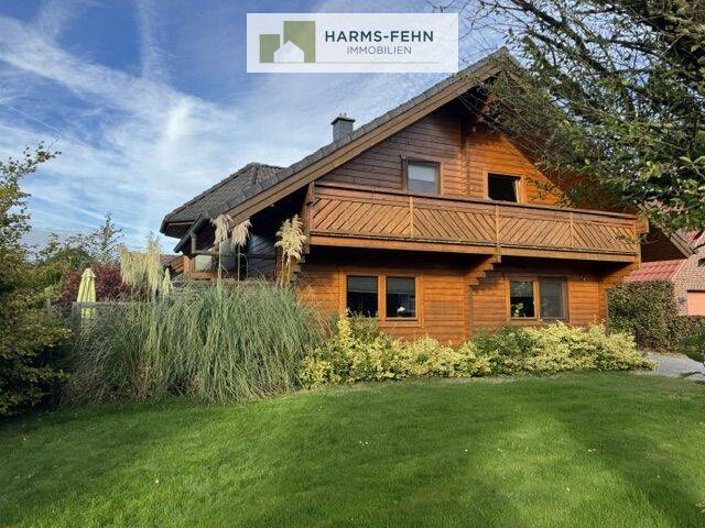 „Wohnen mit besonderem Flair: Großzügiges Holzhaus mit Galerie, Glaserker und uneinsehbarem Garten“ im Zentrum von Rhauderfehn  K.P. 379.000,-, 26817 Rhauderfehn