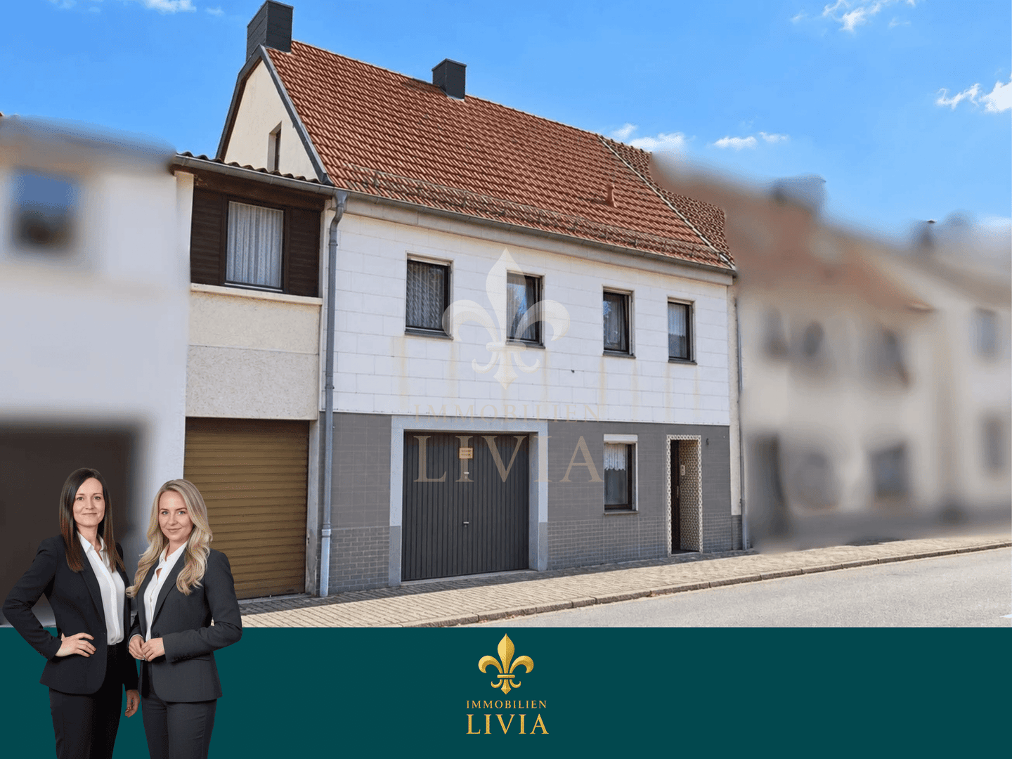 Reihenmittelhaus mit Terrasse, Balkon und Garagen in Saarbrücken-Bischmisheim, 66132 Saarbrücken