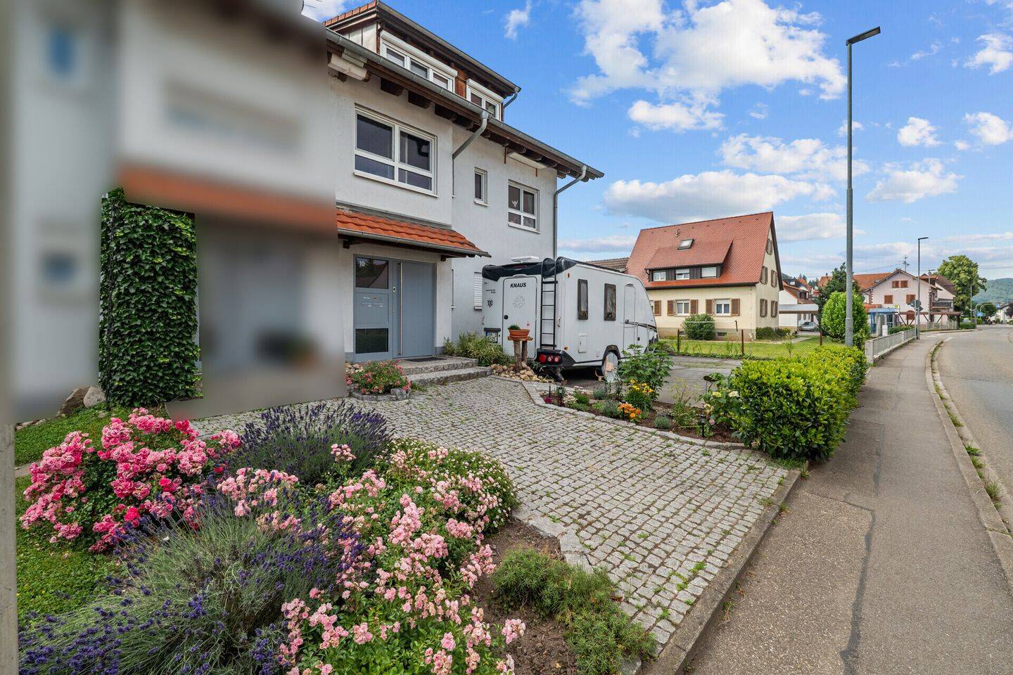 Wunderschöne 4-Zimmer-Maisonette mit zwei Balkonen, Garten und Solar-Carport in 79350 Sexau, 79350 Sexau