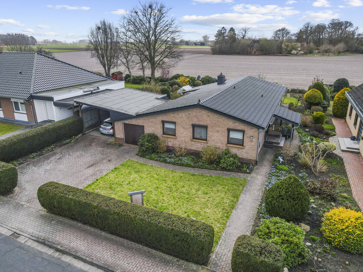 Ganderkesee-Bookholzberg | Charmanter Bungalow mit Wintergarten, Carport, Garage und Feldblick, 27777 Ganderkesee