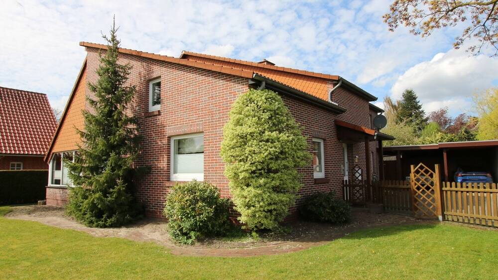 Attr. Einfamilienhaus m. Wintergarten, Carport u. Garten in zentrumsnaher Sackgassenlage in Edewecht, 26188 Edewecht
