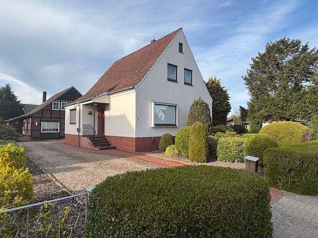 Einfamilienhaus mit zusätzlichem Nebengebäude und großzügigem Garten in zentraler Lage von Grasberg, 28879 Grasberg