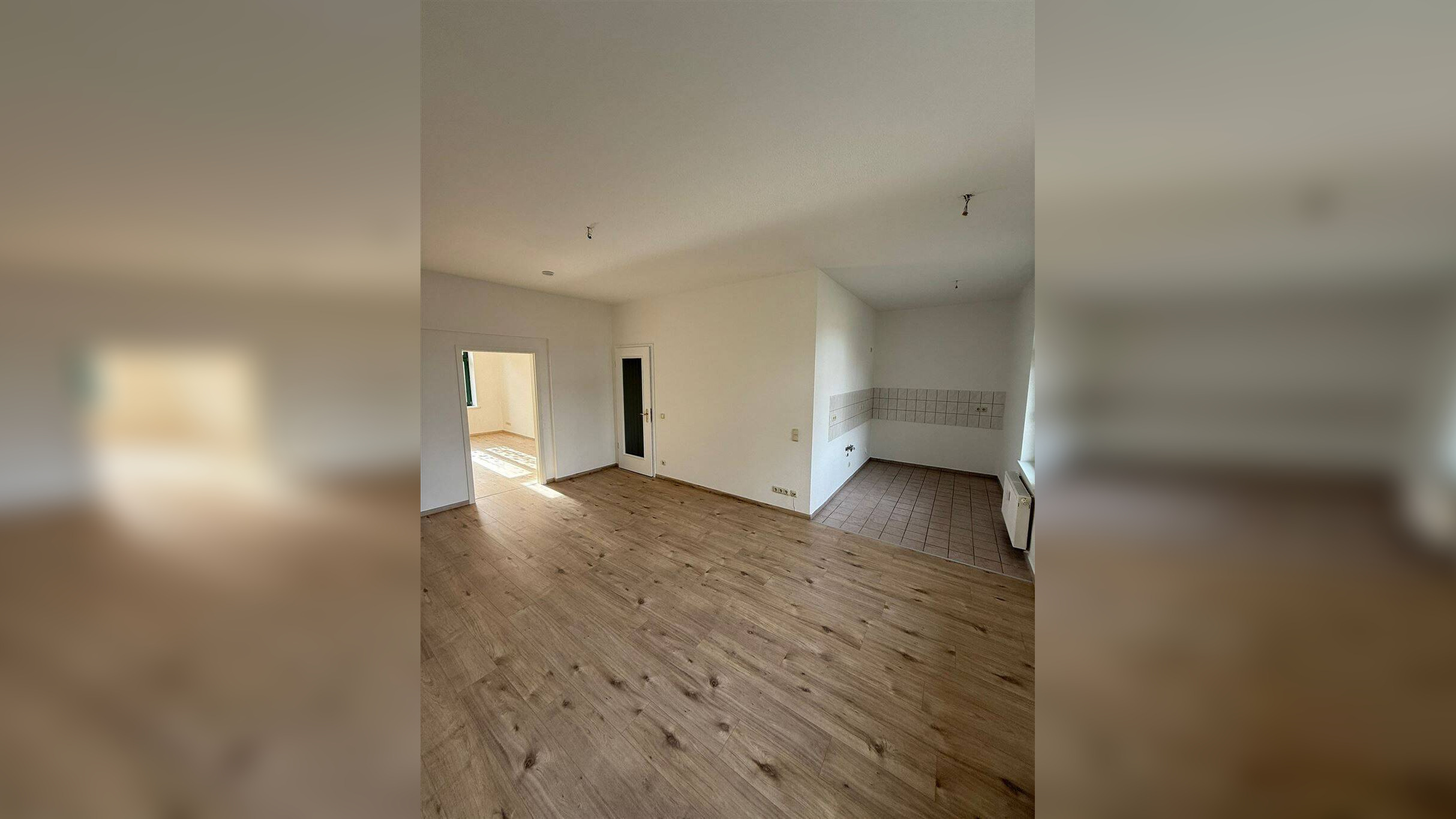 Großzügige 2-Zimmer mit neuem Laminat, Dusche und Balkon in ruhiger Lage!