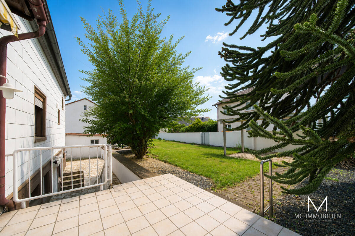 MG – Solides Einfamilienhaus mit Doppelgarage, Garten & Potenzial in zentraler Lage von Spesbach, 66882 Hütschenhausen
