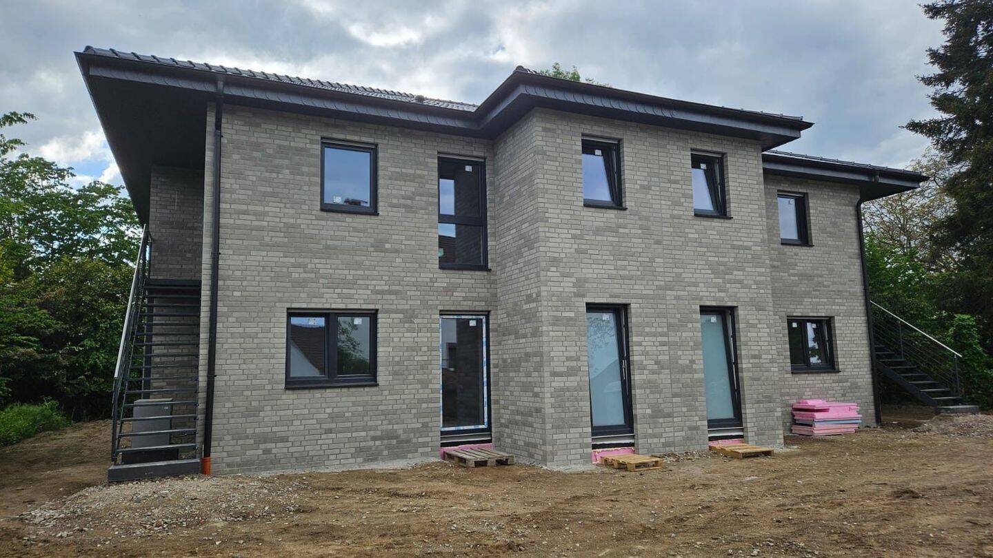 Moderne EG-Wohnung (linke Haushälfte) mit eigenem Garten & EH 55, 33775 Versmold